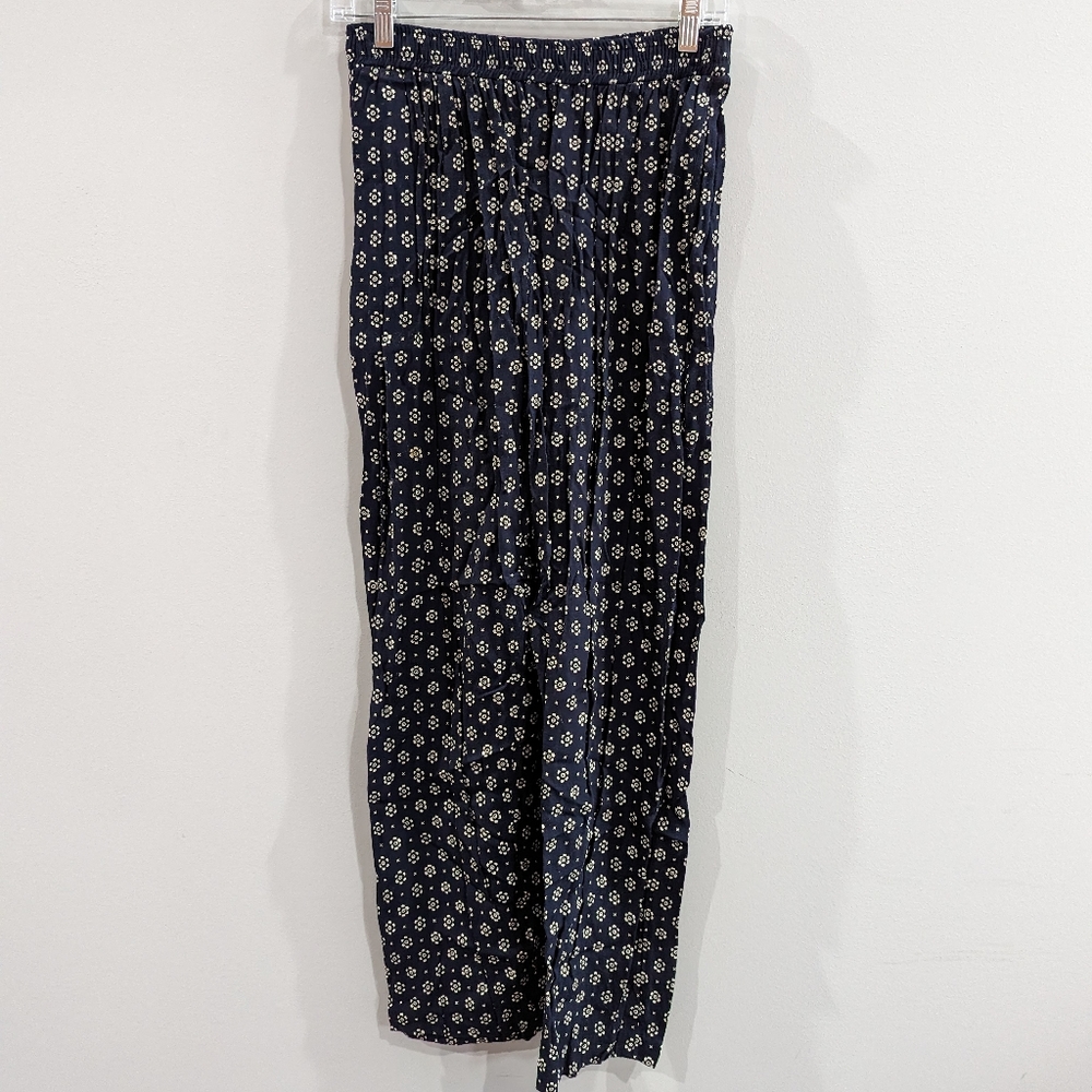 Blue and white patterned trousers